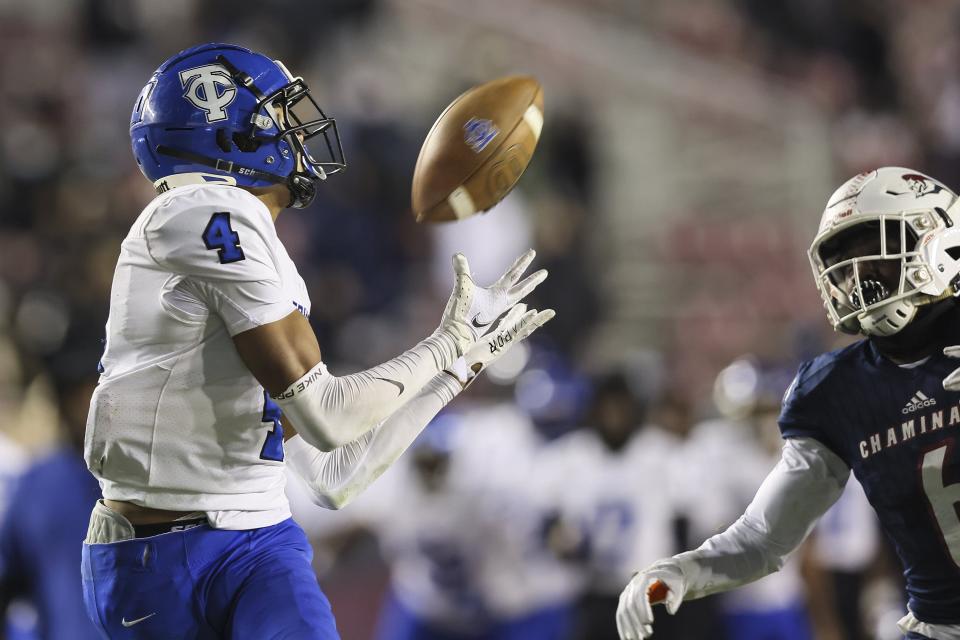 Trinity Christian's Marcus Burke (4) catches a fourth-quarter touchdown pass against Chaminade-Madonna in the 2020 Class 3A football final. Next month's FHSAA football championships will be televised on Bally Sports.