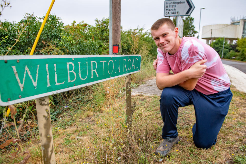 A teenage boy annoyed by road signs left dirty and hedges overgrown during lockdown has become a local hero after going on a mission to clean them all up. Joseph Beer, 15, noticed dozens of neglected street signs and hedgerows whilst out on his daily walks with mum Lisa, 52. He soon decided he wanted to clean up the streets - and with the help of dad Mark, 56, he rigged up a trailer to fix to the back of his bike, and started peddling around the streets near his house. Almost every day, Joseph, from Chatteris, Cambs., has headed off on his bike, towing a bucket of soapy water, some sponges, and garden tools, including hedgecutters and a rake, in the trailer.

His efforts have seen him clean up street name signs that have been left almost unreadable due to moss growing over them, such as Wilburton Road in nearby Ely.