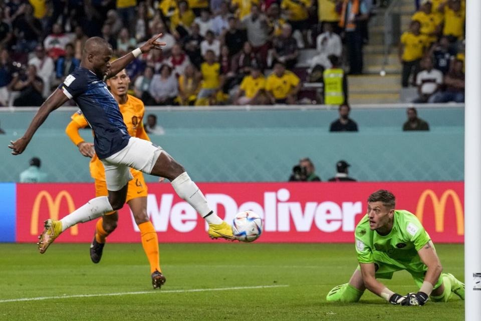 Ecuador's Enner Valencia scores against the Netherlands on Friday.