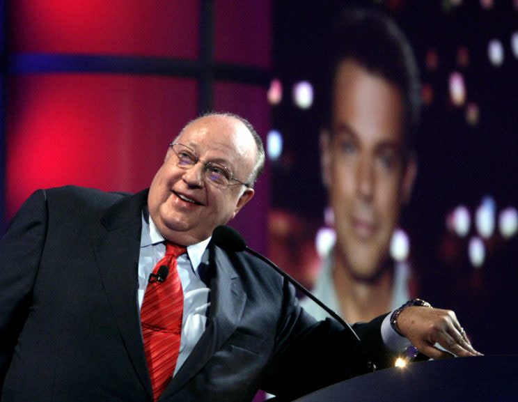 In this July 24, 2006 file photo, Roger Ailes, chairman and chief executive officer of Fox News, listens as anchor Shepard Smith, seen on screens in front and behind him, as Smith talks to the audience via satellite from Israel, at the Summer Television Critics Association Press Tour in Pasadena, Calif. (Photo: Reed Saxon/AP)