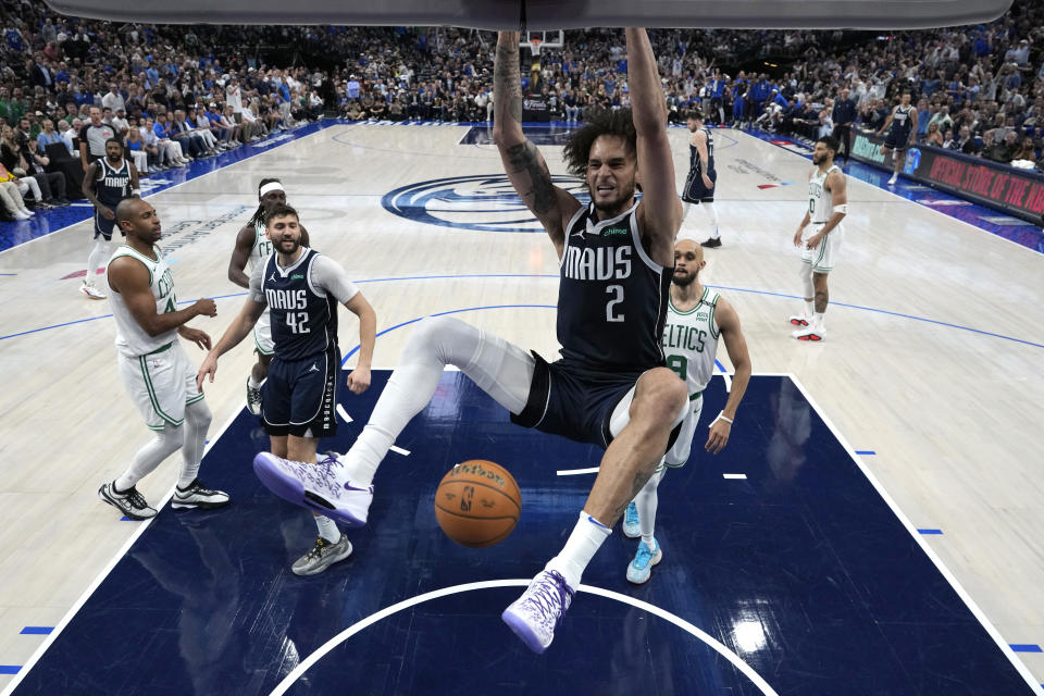 DALLAS, TEXAS - JUNE 14: Dereck Lively II #2 of the Dallas Mavericks dunks the ball in game four of the 2024 NBA Finals against the Boston Celtics at American Airlines Center on June 14, 2024 in Dallas, Texas.  NOTE TO USER: User expressly acknowledges and agrees that by downloading and/or using this photograph, User is agreeing to the terms and conditions of the Getty Images License Agreement.  (Photo by Stacy Revere/Getty Images)