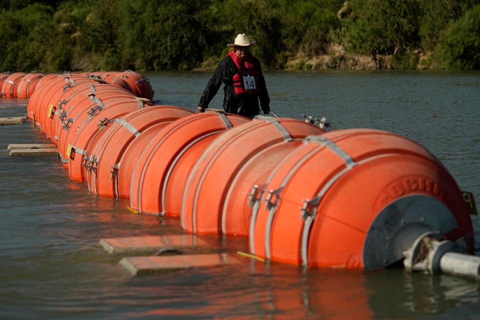 A judge has ordered Texas to remove floating buoys in the Rio Grande (Associated Press)