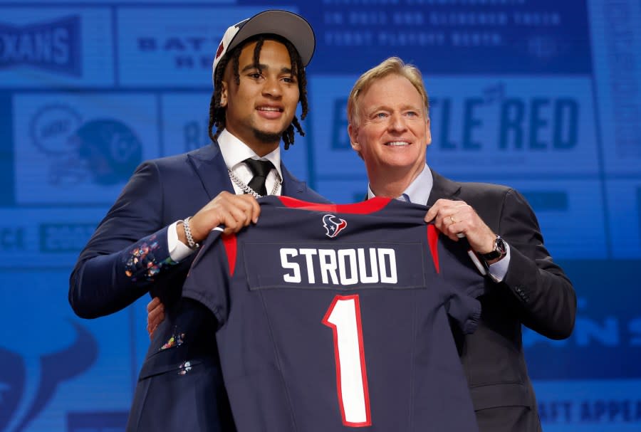 KANSAS CITY, MISSOURI – APRIL 27: (L-R) C.J. Stroud poses NFL Commissioner Roger Goodell after being selected second overall by the Houston Texans during the first round of the 2023 NFL Draft at Union Station on April 27, 2023 in Kansas City, Missouri. (Photo by David Eulitt/Getty Images)