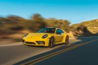 <p>The 911 Carrera T uses the base Carrera's 379-hp twin-turbocharged flat-six but adds performance-enhancing features from elsewhere in the 911 lineup.</p>