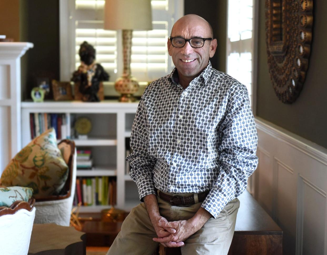 Howell Graham sits at his Landfall home in Wilmington, N.C. Friday, February 10, 2017. In 1990 when Graham was 28, he was the first patient to receive a double lung transplant at UNC-Chapel Hill.  Graham died Nov. 9 at the age of 60.