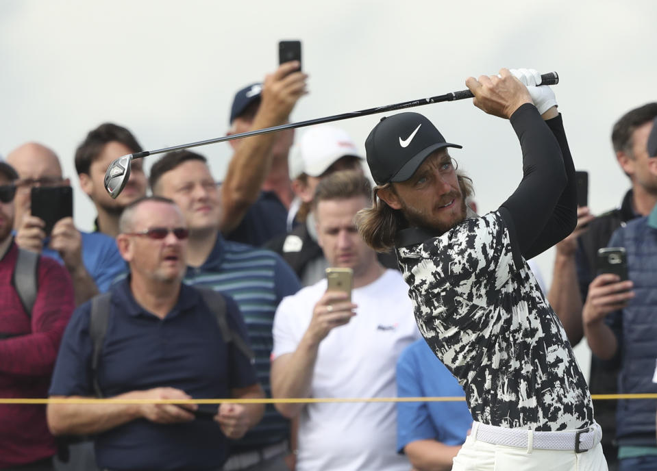 England's Tommy Fleetwood plays his tee shot on the 9th hole during the second round of the British Open Golf Championships at Royal Portrush in Northern Ireland, Friday, July 19, 2019.(AP Photo/Jon Super)