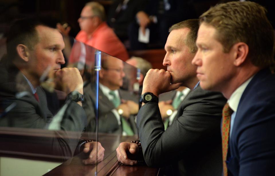 Mayor Lenny Curry at left, listens intently with JAX Chamber President Daniel Davis beside him when the state House of Representatives approved legislation in February 2016 allowing Duval County voters to cast ballots on a half-cent sales tax for paying down the city's massive pension debt.