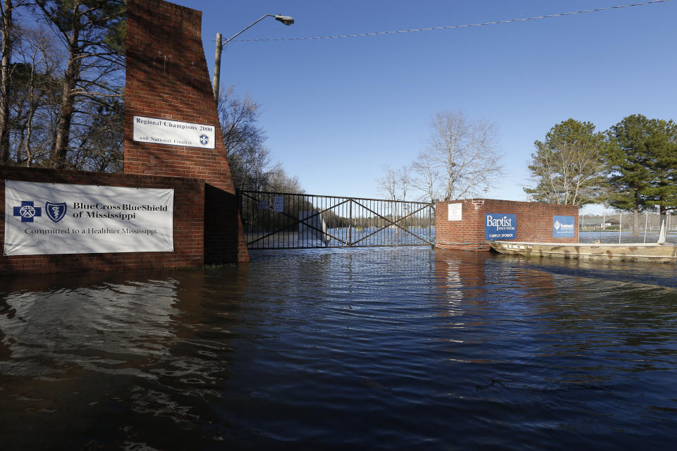 A soccer complex in northeast Jackson, Miss., Friday, Feb. 14, 2020, is underwater from flooding. As of Friday afternoon, the Pearl River was at 35.48 feet, which is more than 7 feet above flood stage. (AP Photo/Rogelio V. Solis)