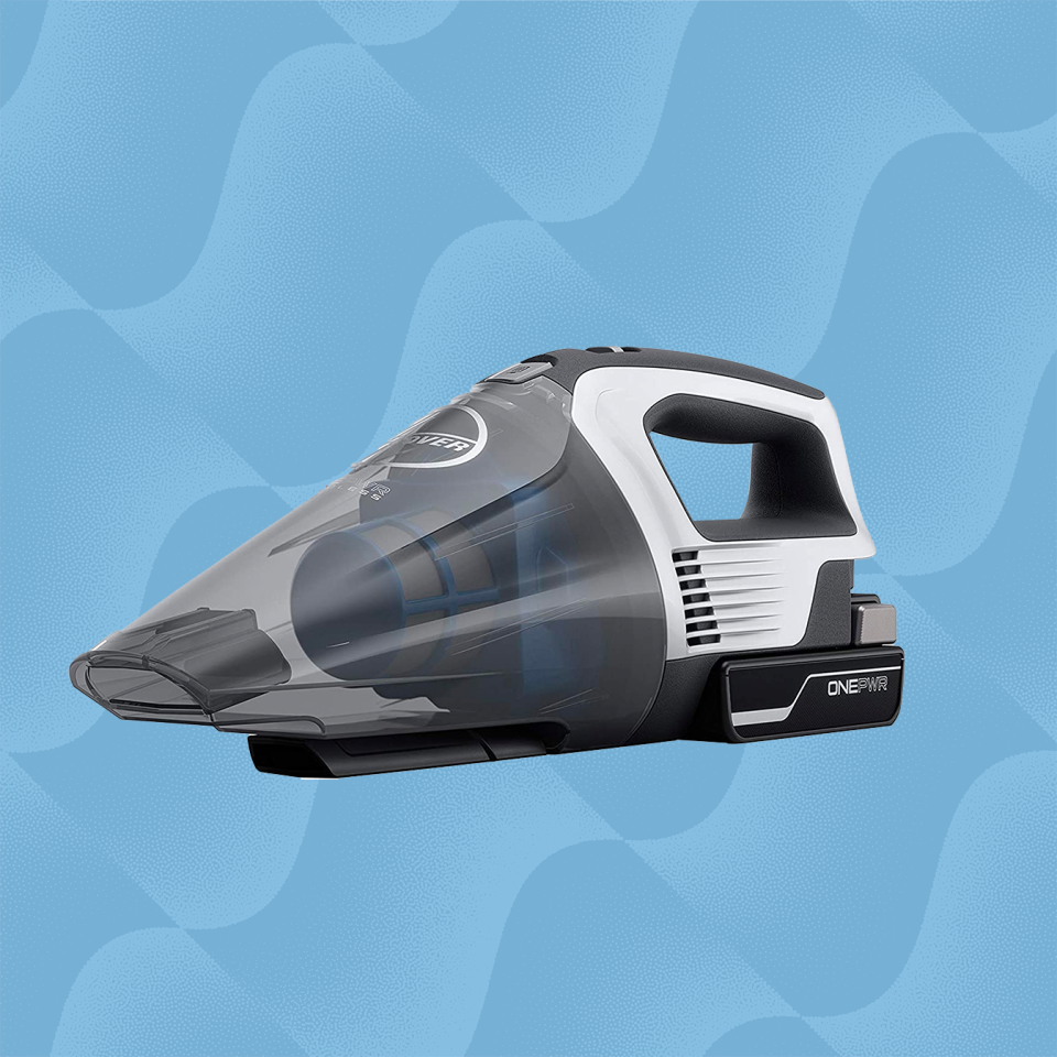 the hoover onepwr cordless hand held vacuum against a wave blue background