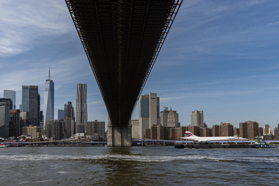 A retired British Airways Concorde supersonic aircraft is transported by barge on the East River, Wednesday, March 13, 2024, in New York. (AP Photo/Peter K. Afriyie)