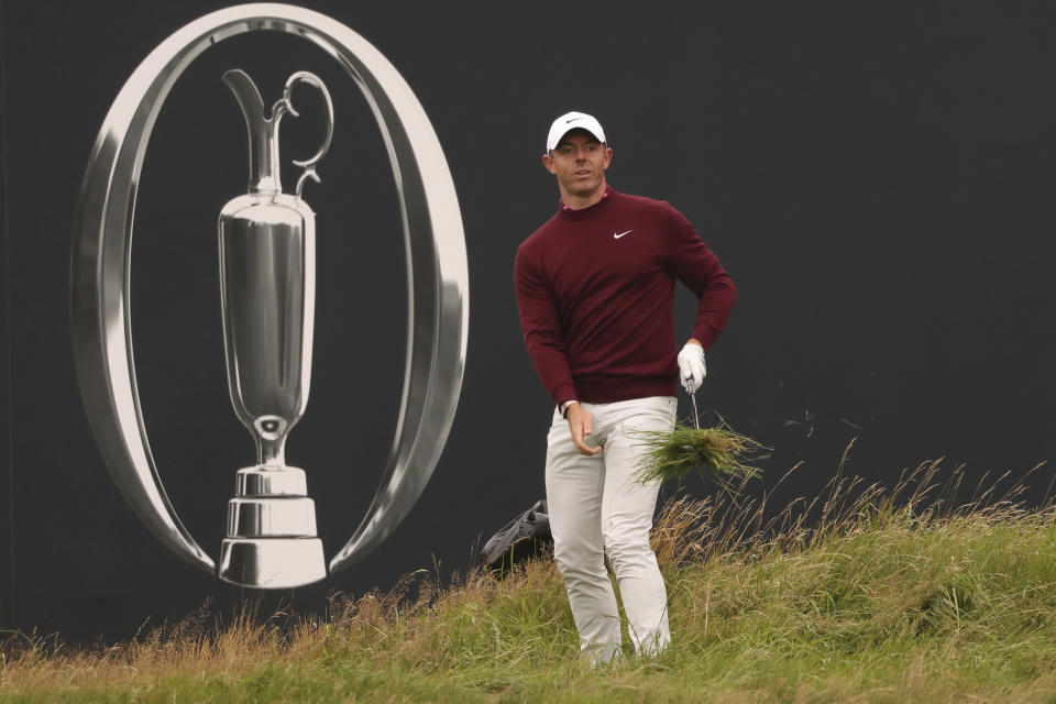 Northern Ireland's Rory McIlroy chips onto the 18th green from the rough during a practice round for the British Open Golf Championships at the Royal Liverpool Golf Club in Hoylake, England, Tuesday, July 18, 2023. The Open starts Thursday, July 20. (AP Photo/Peter Morrison)