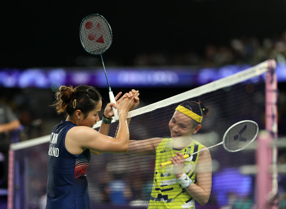 PARIS, FRANCE - JULY 31:  Ratchanok Intanon of Team Thailand interacts with Tzu Yin Tai of Team Chinese Taipei  during the Badminton Women's Singles Group Play Stage match on day five of the Olympic Games Paris 2024 at Porte de La Chapelle Arena on July 31, 2024 in Paris, France. (Photo by Lintao Zhang/Getty Images)