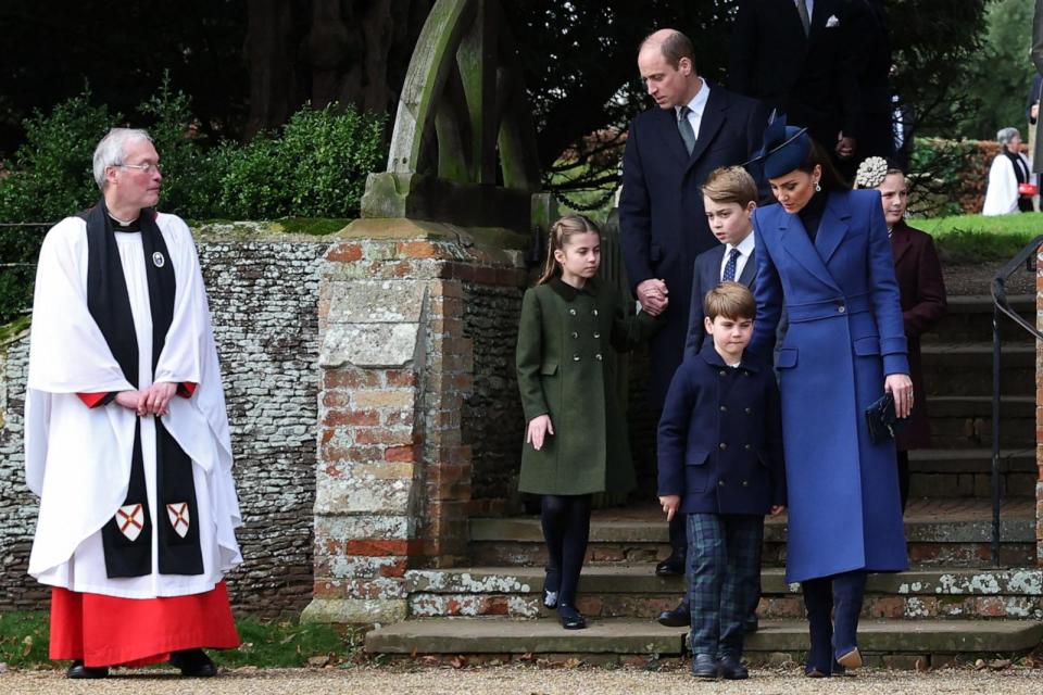 PHOTO: Prince William, Princess Charlotte, Catherine and Princess of Wales walk away from the church with Prince George of Wales and Prince Louis of Wales after attending  the Royal Family's traditional Christmas Day service in England, Dec. 25, 2023.  (Adrian Dennis/AFP via Getty Images)
