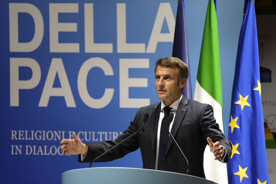 French President Emmanuel Macron delivers his speech at "Cry for peace" an international conference for peace organized by the Community of Sant'Egidio in Rome, Sunday, Oct. 23, 2022. (AP Photo/Alessandra Tarantino)