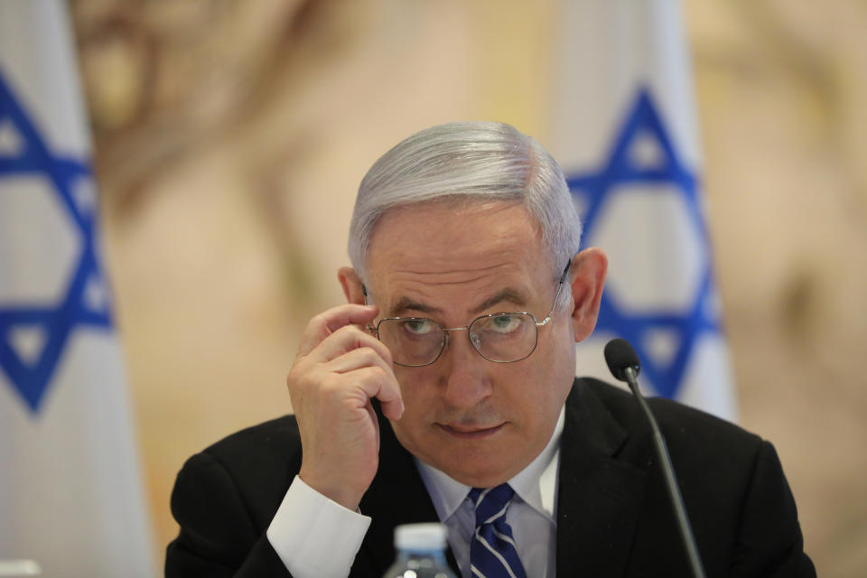 Israeli Prime Minister Benjamin Netanyahu attends the first Cabinet meeting of the new government at the Chagall Hall in the Knesset, the Israeli Parliament in Jerusalem, Israel, Sunday, May 24, 2020. (Abir Sultan/Pool Photo via AP)