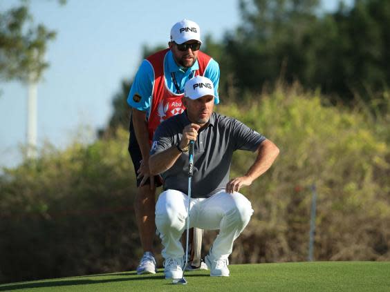 Lee Westwood lines up a putt en route to winning his 25th European Tour title (Getty)