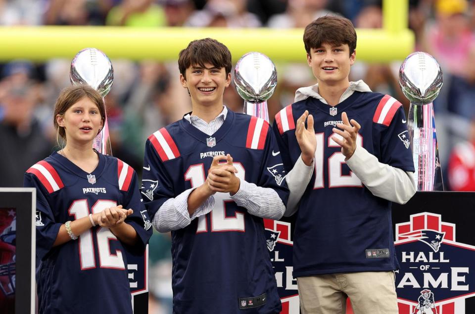 PHOTO: The children of former New England Patriots quarterback Tom Brady, Vivian, left, Benjamin, center, and Jack, look on during a ceremony honoring Brady at halftime of a New England game at Gillette Stadium, Sept. 10, 2023, in Foxborough, Mass. (Maddie Meyer/Getty Images, FILE)