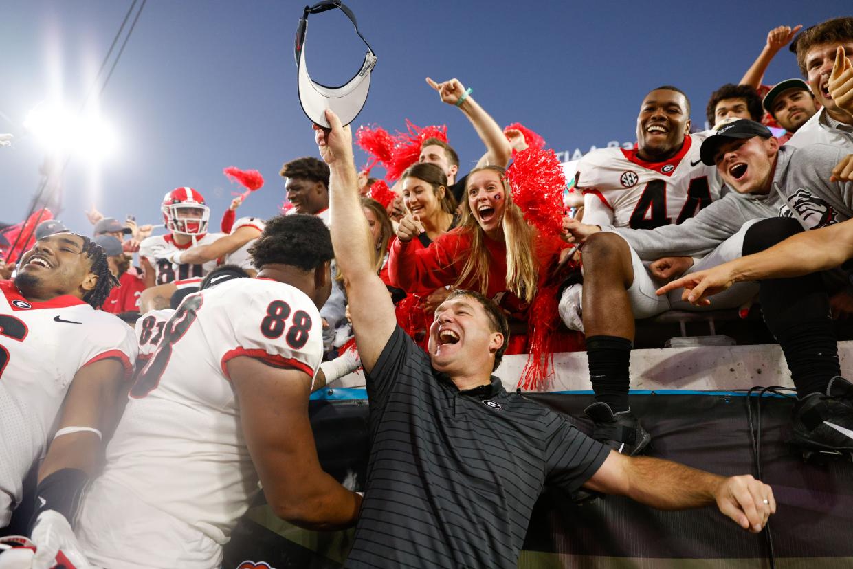 The top-ranked Georgia Bulldogs celebrate their win over rival Florida earlier this season.