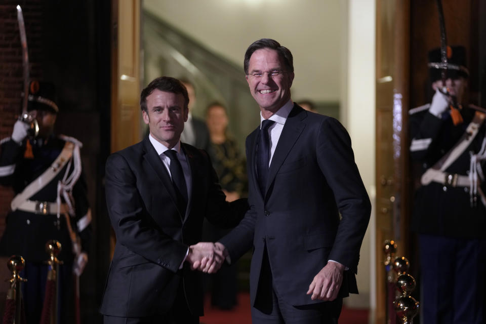 French President Emmanuel Macron, left, and Dutch Prime Minister Mark Rutte meet in The Hague, Netherlands, Monday, Jan. 30, 2023. Macron visits Rutte in the Netherlands, with Ukraine, migration among issues on the agenda. (AP Photo/Peter Dejong)