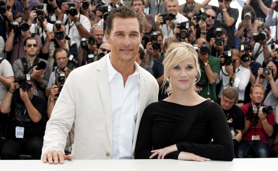 Actors Matthew McConaughey, left, and Reese Witherspoon pose during a photo call for Mud at the 65th international film festival, in Cannes, southern France, Saturday, May 26, 2012. (AP Photo/Jonathan Short)