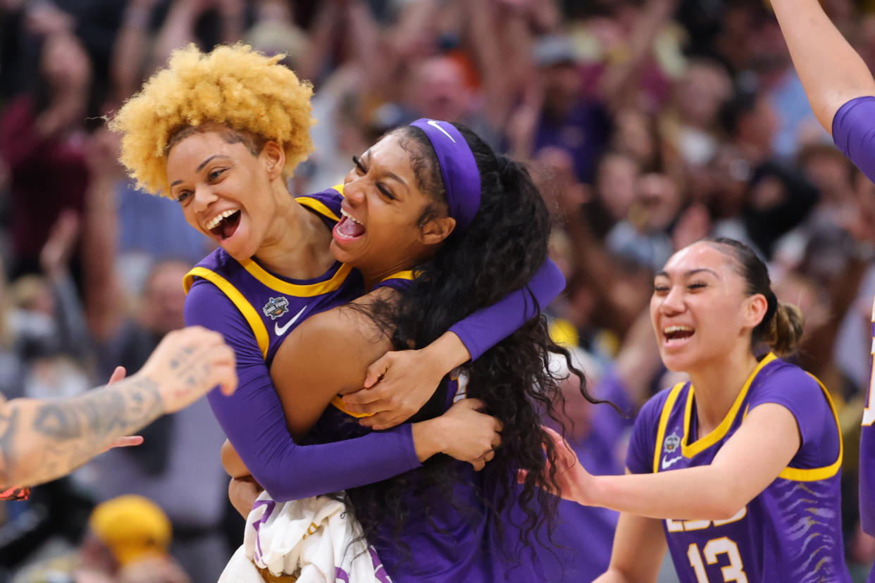 LSU's Jasmine Carson and Angel Reese celebrate during the NCAA women's tournament national championship game at American Airlines Center in Dallas on April 2, 2023. (C. Morgan Engel/NCAA Photos via Getty Images)