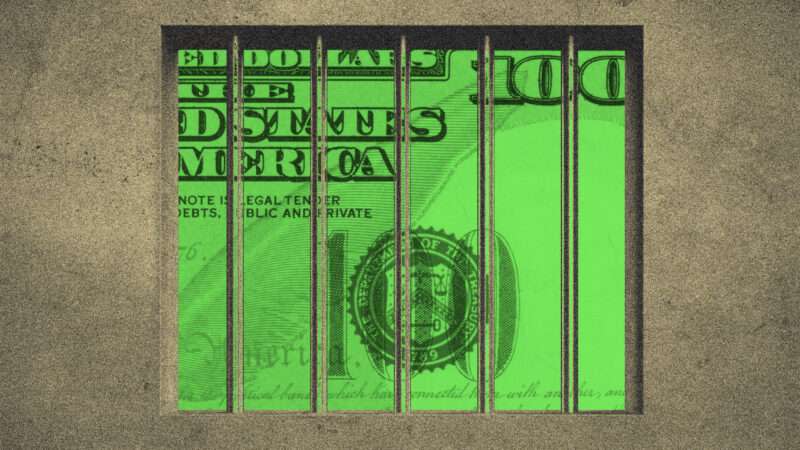 A $100 bill behind bars