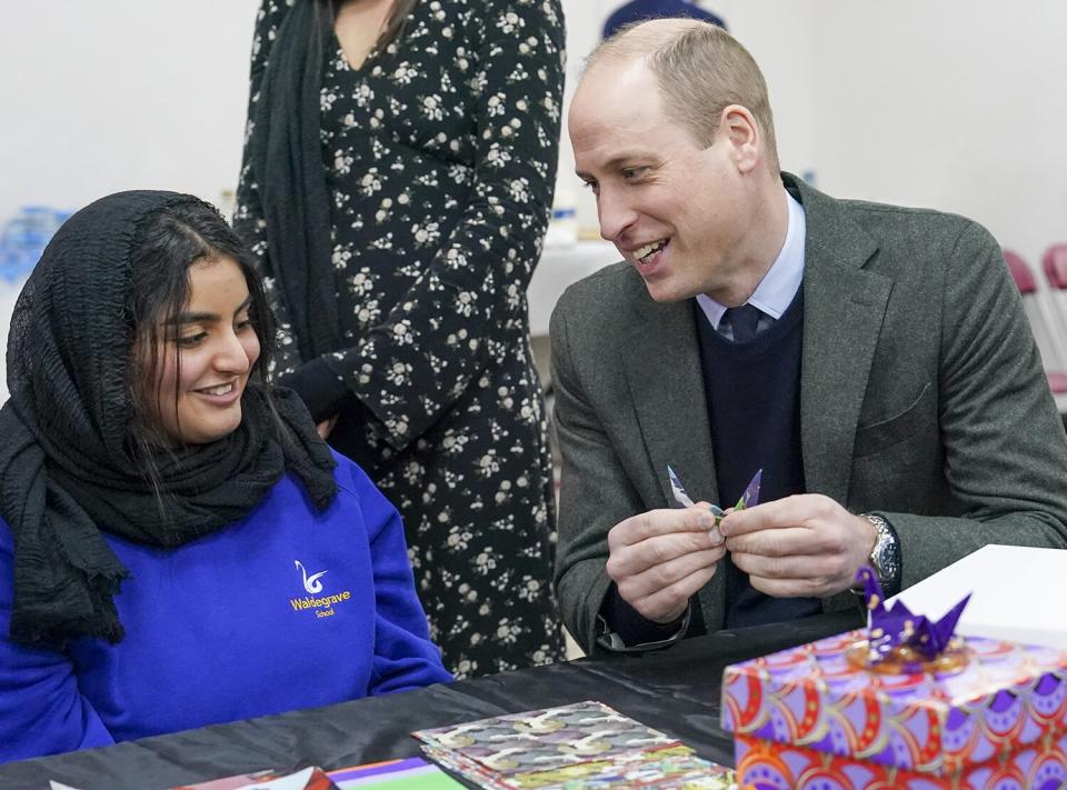 Prince William, Prince of Wales makes paper craPrince William, Prince of Wales makes paper cranes with Lina Alkutbi, 15, as he and Catherine, Princess of Wales (not pictured) visit Hayes Muslim Centre nes with Lina Alkutbi, 15, as he and Catherine, Princess of Wales (not pictured) visit Hayes Muslim Centre