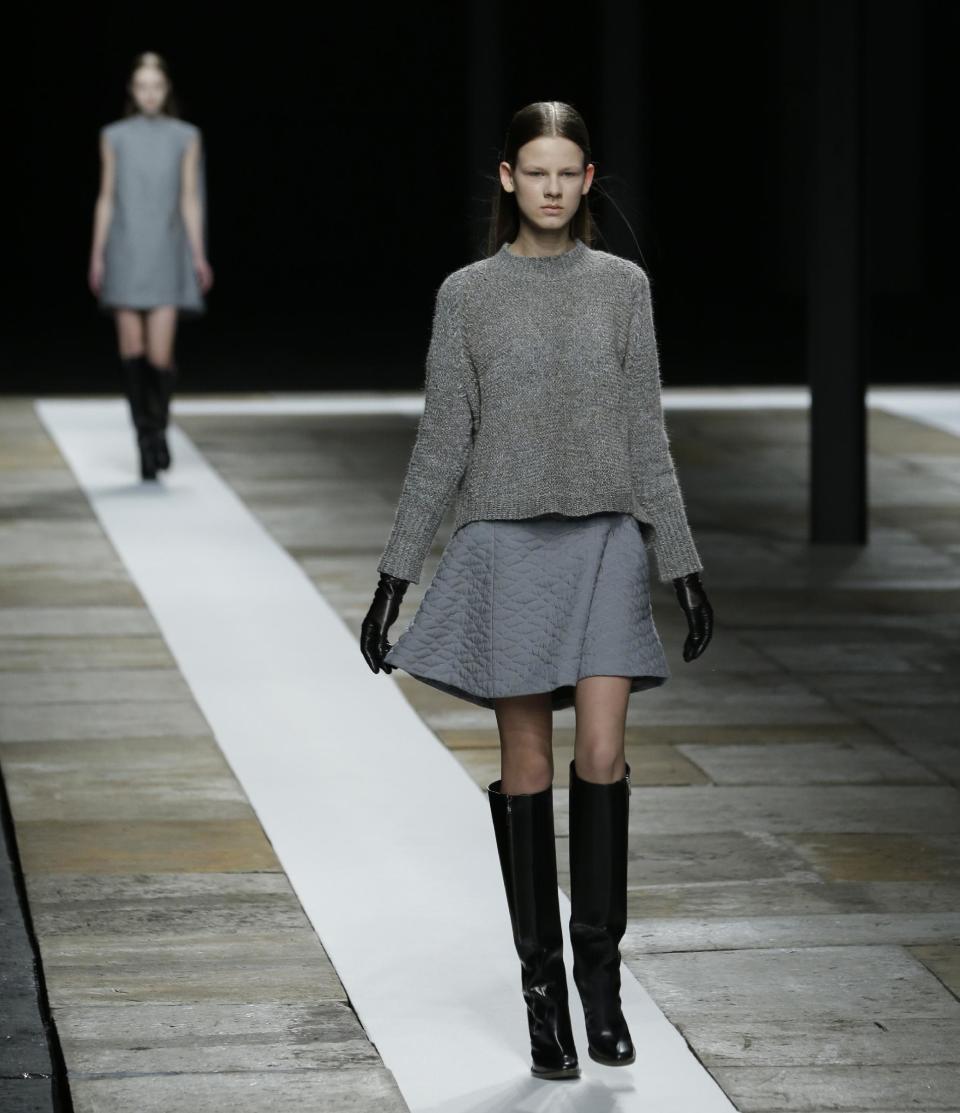 A model walks the runway during the Theyskens Theory Fall 2013 runway show at Fashion Week in New York, Monday, Feb. 11, 2013. (AP Photo/Kathy Willens)