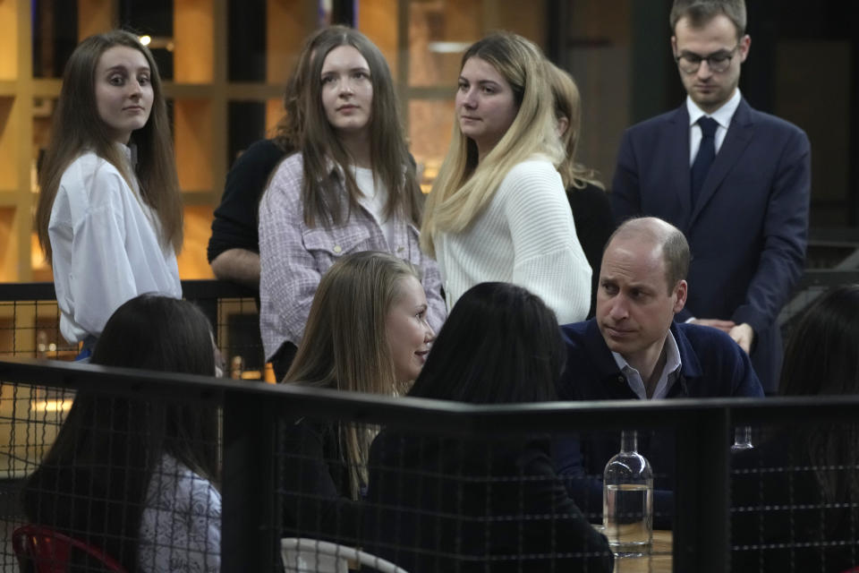 Britain's Prince William meets with group of young Ukrainian refugees, who since fleeing the war have settled in Warsaw, Poland, Thursday, March 23, 2023. (AP Photo/Czarek Sokolowski)