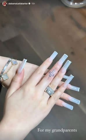 <p>Alabama Luella Barker/ Instagram</p> Alabama Barker debuts new finger tattoo alongside caption: "For my grandparents."