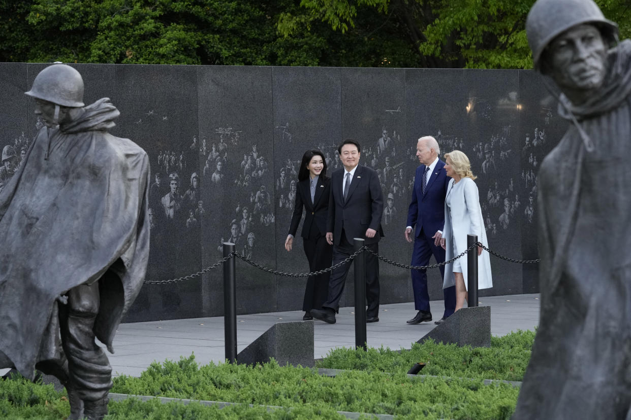 President Joe Biden, first lady Jill Biden, South Korea's President Yoon Suk Yeol and his wife Kim Keon Hee visit the Korean War Veterans Memorial in Washington, Tuesday, April 25, 2023. (AP Photo/Susan Walsh)