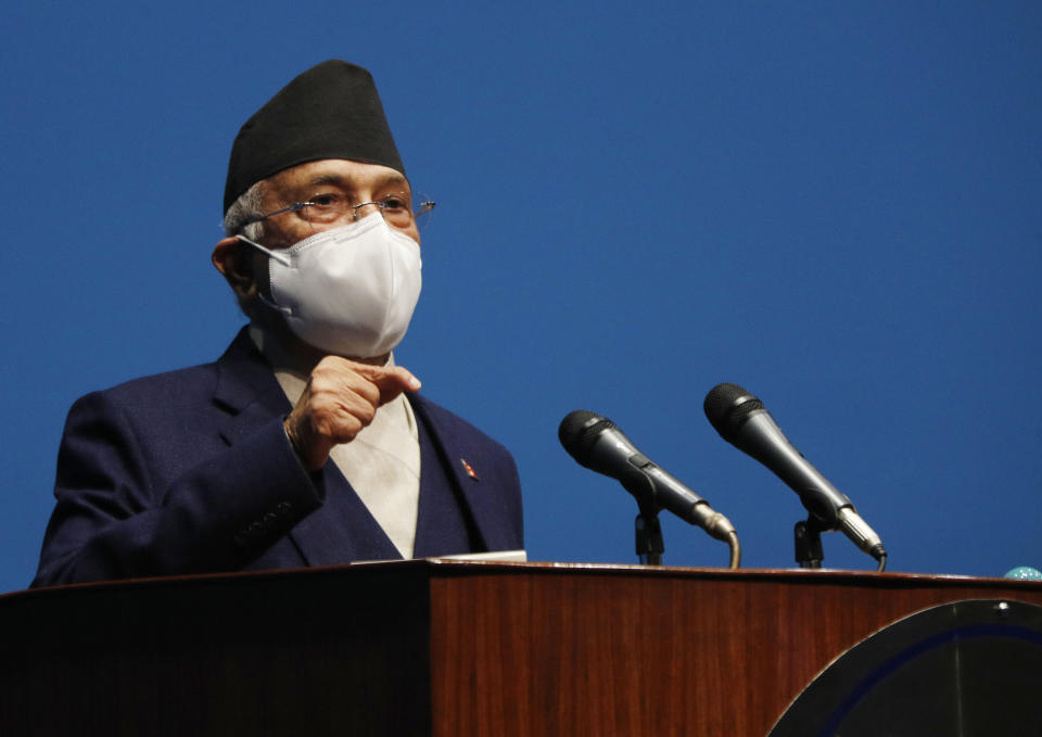 Nepal Prime Minister Khadga Prasad Oli speaks at the parliament in Kathmandu, Nepal, Monday, May 10, 2021. Oli asked parliament for a vote of confidence on Monday in an attempt to show he still has enough support to stay in power despite an expected second split within his governing party. (AP Photo/Niranjan Shrestha)