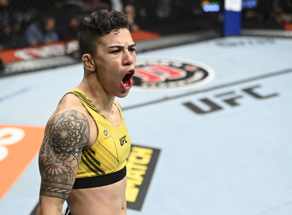 LAS VEGAS, NEVADA - SEPTEMBER 25: Jessica Andrade of Brazil celebrates her win over Cynthia Calvillo in their flyweight fight during the UFC 266 event on September 25, 2021 in Las Vegas, Nevada. (Photo by Jeff Bottari/Zuffa LLC)