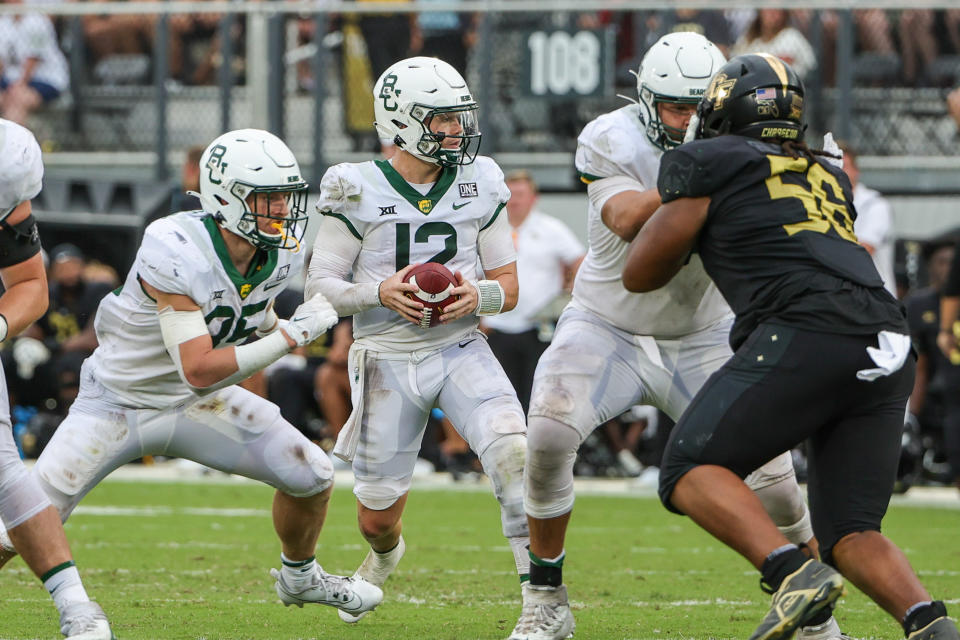 Sep 30, 2023; Orlando, Florida, USA; Baylor Bears quarterback Blake Shapen (12) looks to pass during the second half against the UCF Knights at FBC Mortgage Stadium. Mandatory Credit: Mike Watters-USA TODAY Sports