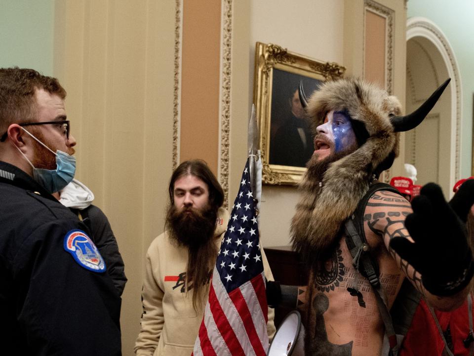 Qanon shaman viking riot capitol