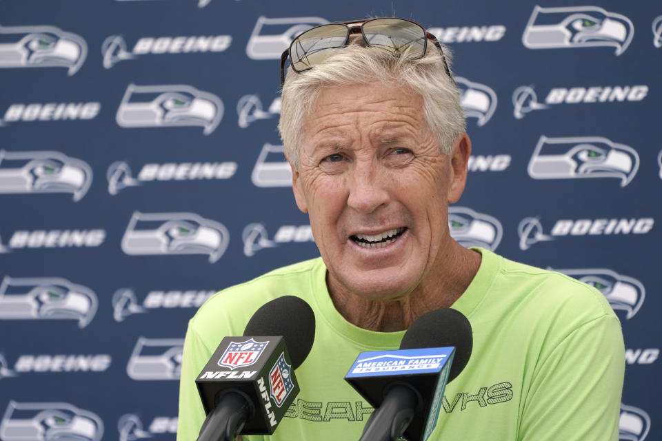 Seattle Seahawks head coach Pete Carroll talks with reporters after NFL football practice Wednesday, July 28, 2021, in Renton, Wash. (AP Photo/Ted S. Warren)