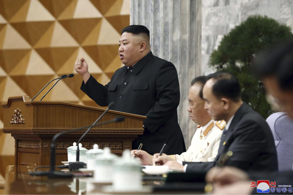 In this photo provided by the North Korean government, North Korean leader Kim Jong Un, left, attends at a meeting of Central Committee of Worker’s Party of Korea in Pyongyang, North Korean, Monday, Feb. 8, 2021. Independent journalists were not given access to cover the event depicted in this image distributed by the North Korean government. The content of this image is as provided and cannot be independently verified. Korean language watermark on image as provided by source reads: "KCNA" which is the abbreviation for Korean Central News Agency. (Korean Central News Agency/Korea News Service via AP)