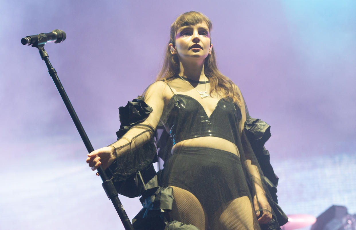 Lauren Mayberry defended her "revealing" gig attire in a candid post [Photo: Getty]