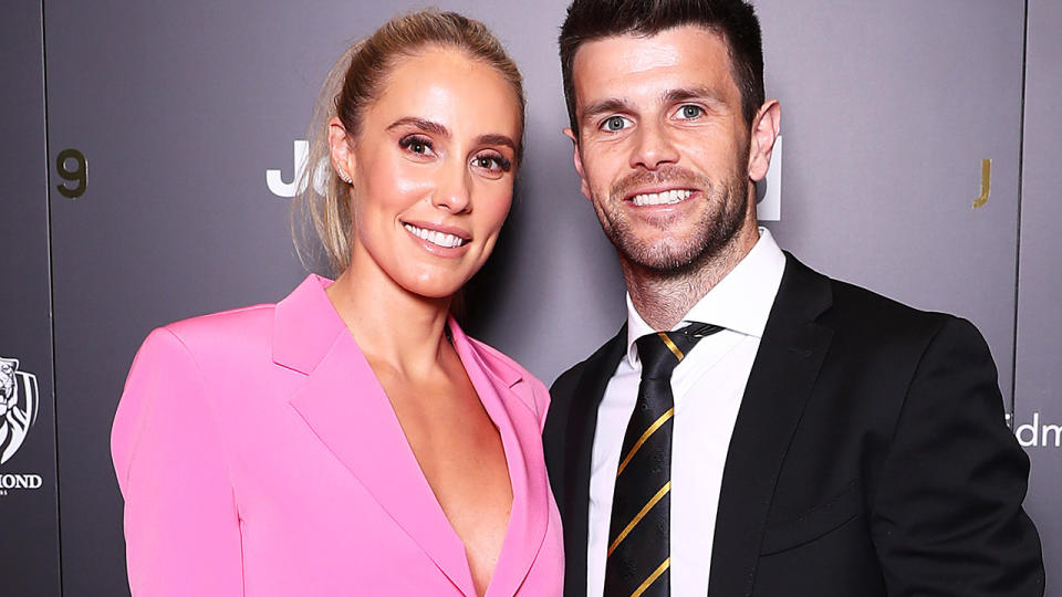 Brooke and Trent Cotchin are pictured posing at the Richmond Tigers best & fairest in 2019. 