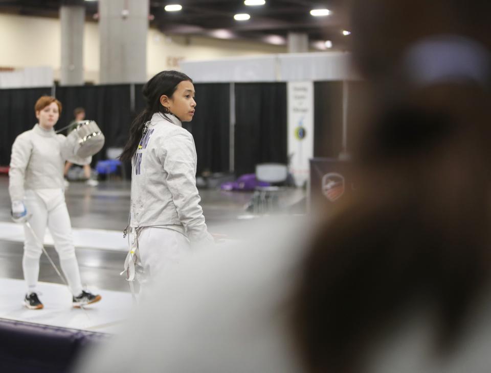 Jul 1, 2023; Phoenix, AZ, United States; Gabriela Hwang, 15, warms up at the 2023 USA Fencing National Championships in Phoenix on Saturday, July 1, 2023. Hwang travels frequently for fencing tournaments and has been to Bulgaria, France, Switzerland, Spain, Colombia, Puerto Rico and Germany all within the past year.