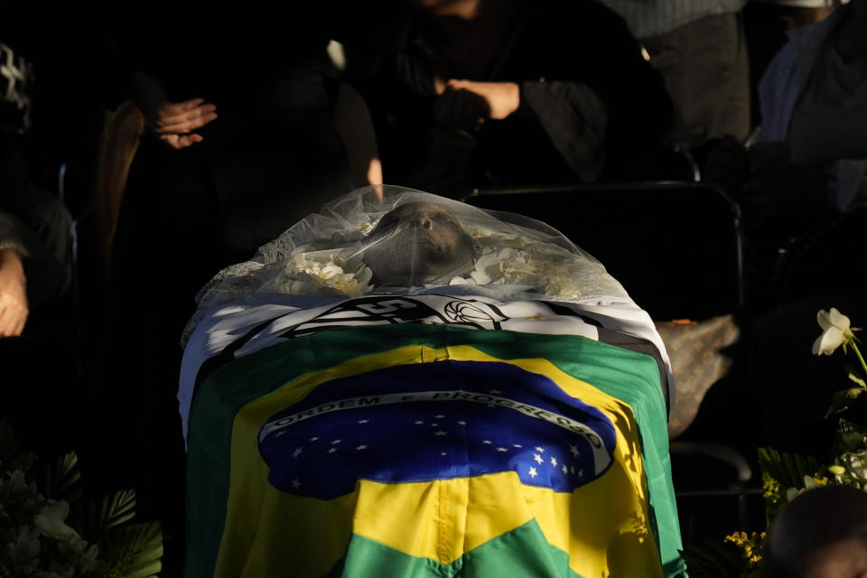 Brazilian soccer great Pele lies in state at Vila Belmiro stadium in Santos, Brazil, Monday, Jan. 2, 2023. (AP Photo/Andre Penner)