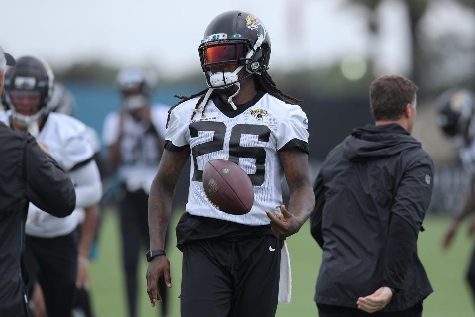 Jaguars CB (26) Shaquill Griffin the ball away during drills on the practice fields outside TIAA Bank Field during the Jacksonville Jaguars  mandatory veterans minicamp session Monday morning, June 14, 2021. [Bob Self/Florida Times-Union]