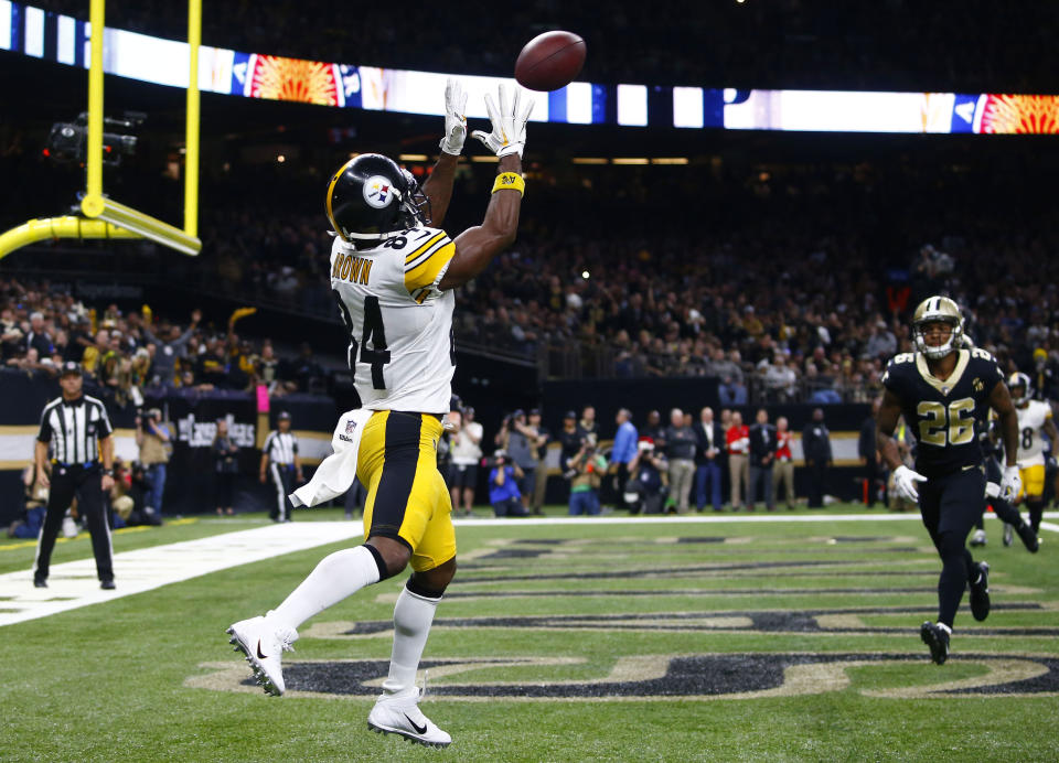 Pittsburgh Steelers wide receiver Antonio Brown (84) pulls in touchdown reception in front of New Orleans Saints cornerback P.J. Williams (26) in the second half of an NFL football game in New Orleans, Sunday, Dec. 23, 2018. (AP Photo/Butch Dill)