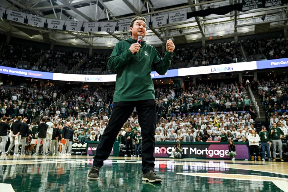 Michigan State's new football coach Jonathan Smith speaks to the crowd during a timeout in the basketball game against Georgia Southern on Tuesday, Nov. 28, 2023, at the Breslin Center in East Lansing.