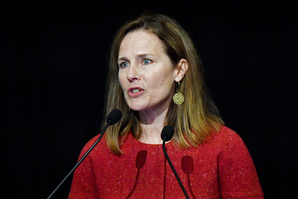 FILE - In this Sept. 12, 2021, file photo U.S. Supreme Court Associate Justice Amy Coney Barrett speaks to an audience at the 30th anniversary of the University of Louisville McConnell Center in Louisville, Ky. Barrett’s confirmation was arguably the most political of any member of the court. She was confirmed on a 52-48 vote, the first in modern times with no support from the minority party. (AP Photo/Timothy D. Easley, File)