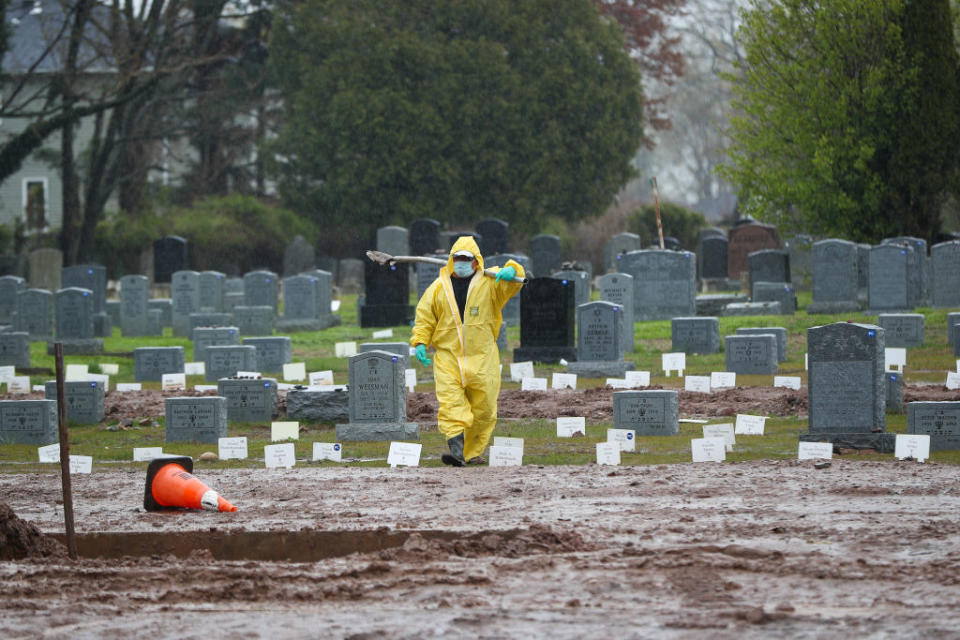 A gravedigger is seen at the Mount Richmond Cemetery which receives Covid-19 deaths in the Staten Island borough of New York in April. Source: Getty