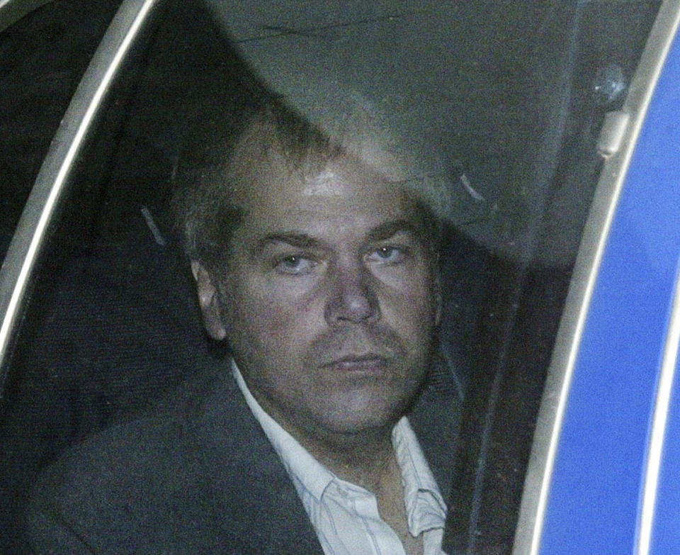 FILE - In this Nov. 18, 2003, file photo, John Hinckley Jr. arrives at U.S. District Court in Washington. Hinckley, who tried to assassinate President Ronald Reagan may soon get the most freedom he's had since since the shooting outside a Washington hotel in 1981. A lawyer for Hinckley Jr. and U.S. attorneys are discussing a possible agreement that would substantially reduce the conditions of Hinckley's release from a mental hospital in 2016, according to federal court hearing on Wednesday, Sept. 23, 2020. (AP Photo/Evan Vucci, File)