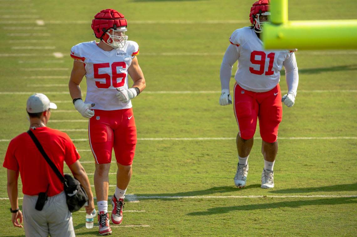 Kansas City Chiefs George Karlaftis (56) warms up during the first padded practice at Chiefs training camp on Monday, Aug. 1, 2022, in St. Joseph.