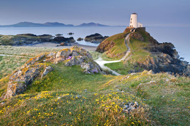 Llanddwyn Island  (Welsh: Ynys Llanddwyn)with the Mountains of The Lleyn Peninsula beyond, Isle of Anglesey, North Wales