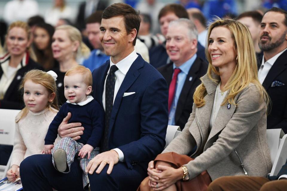 Eli Manning with his wife and children | Sarah Stier/Getty